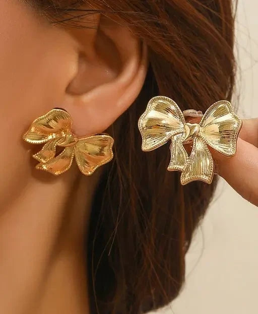 Gold plated ribbon bow stud earrings